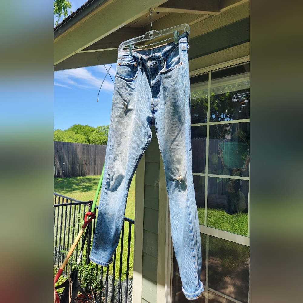 Levi's Blue Straight Legged Jeans with Distressed Details